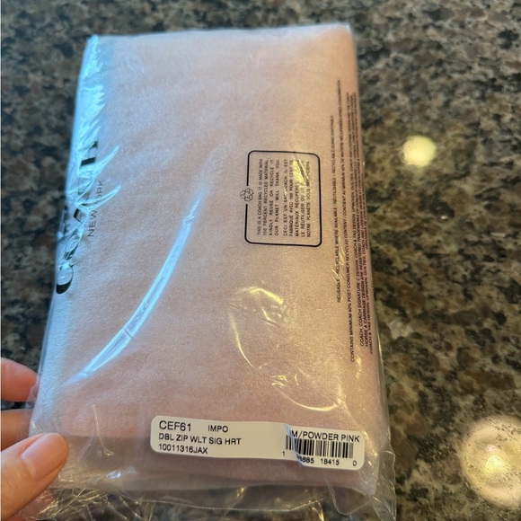 Coach Powder Pink Signature Wristlet - Picture 2 of 16